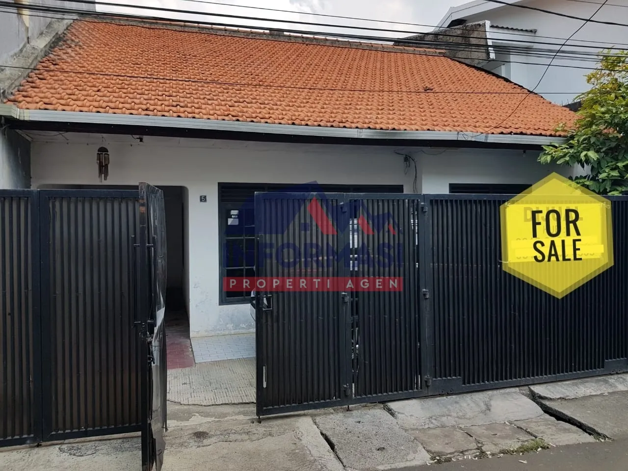 Rumah minimalis Tomang