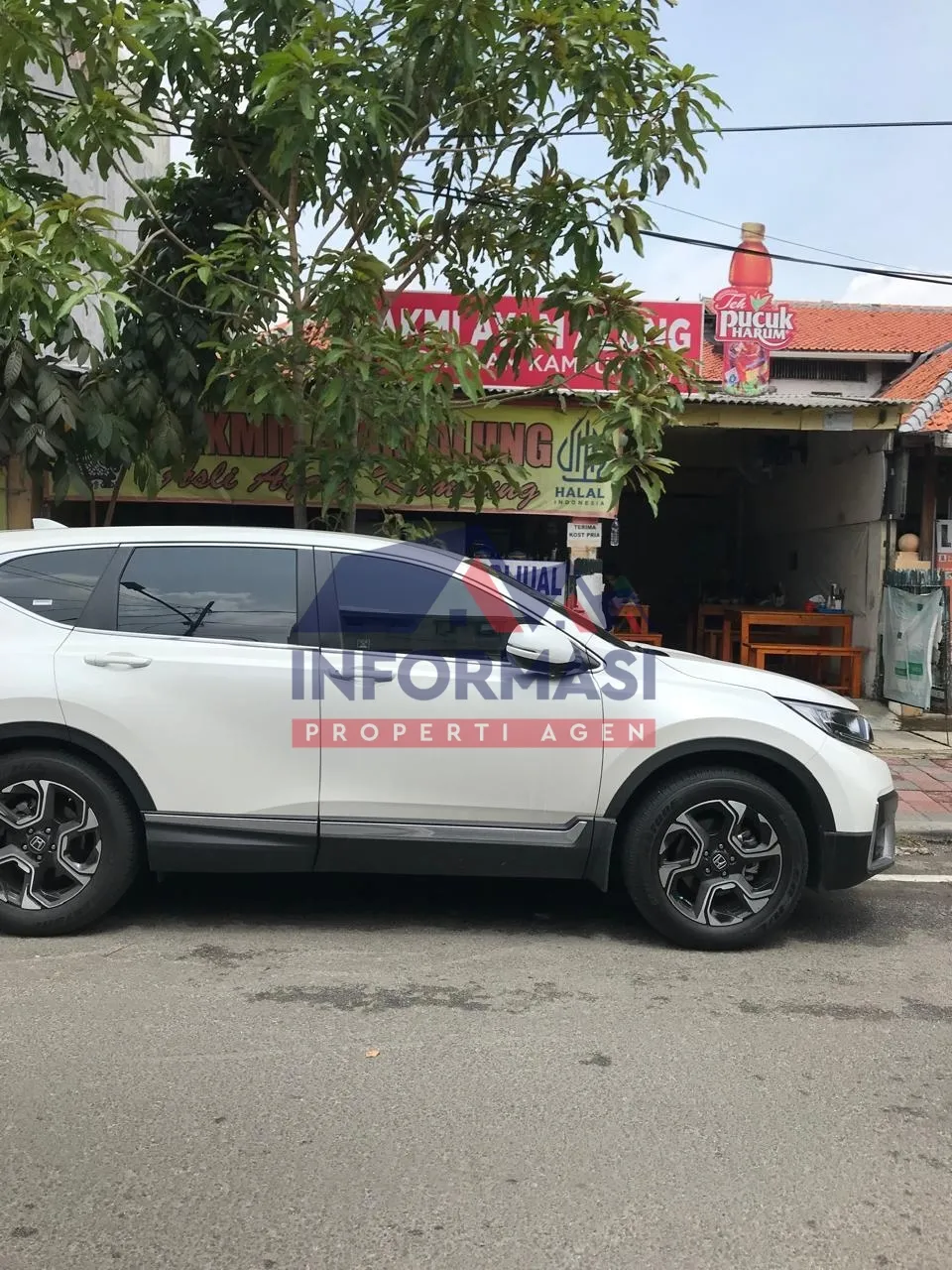 Rumah tua untuk usaha / kost   di jalan raya grogol